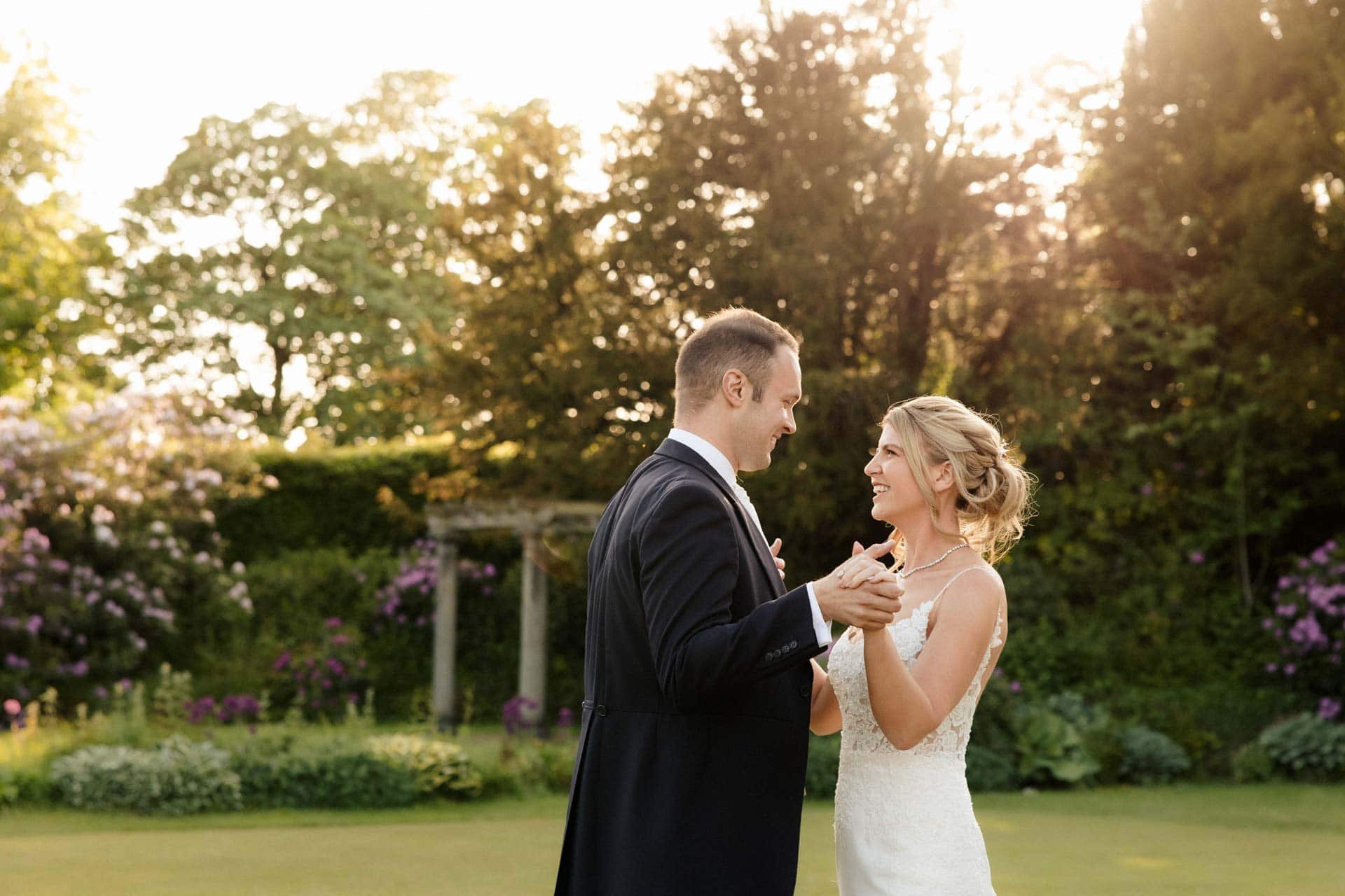 sunset photos at eaves hall in lancashire of a bride and groom