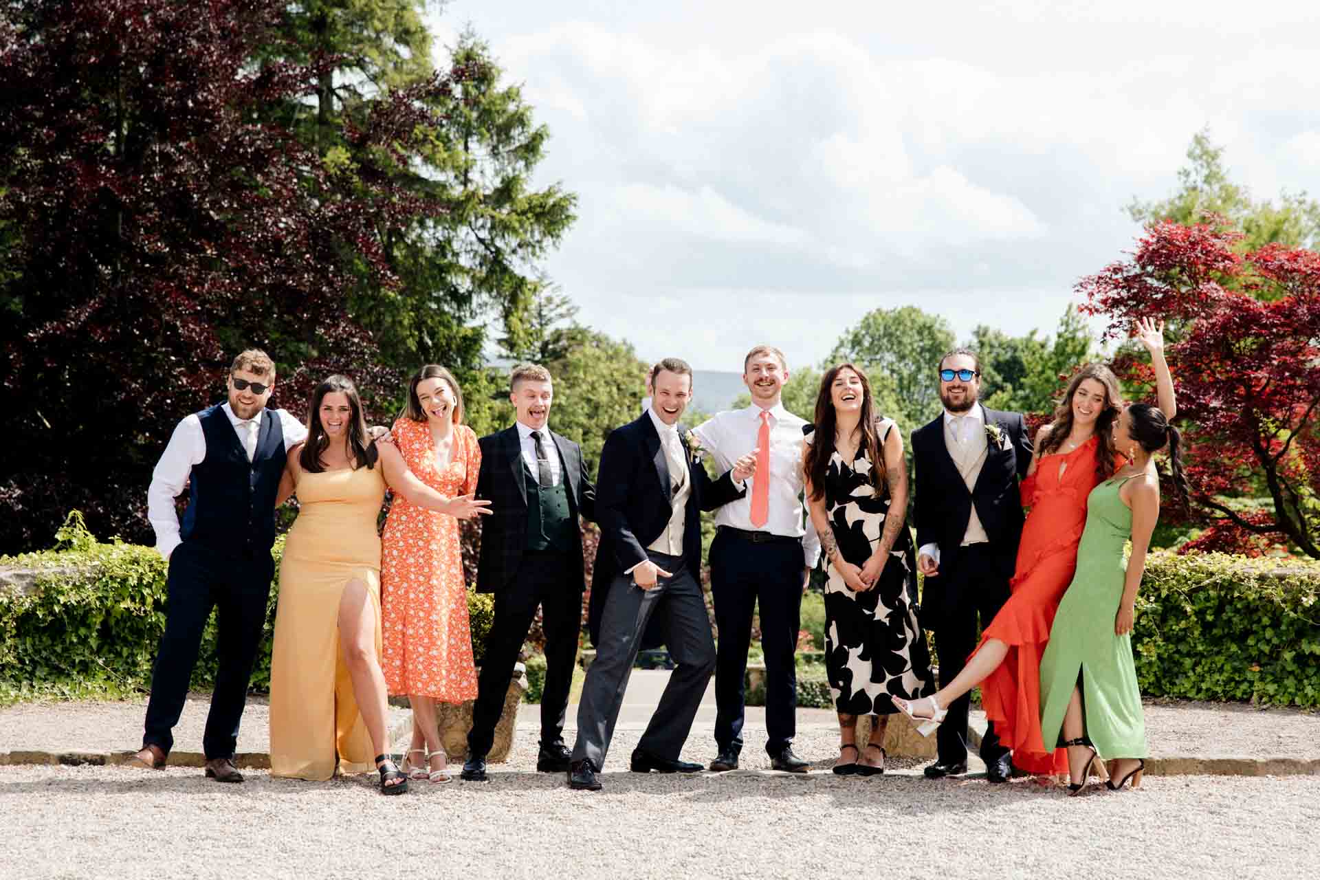 fun groomsmen photographs at eaves hall in lancashire