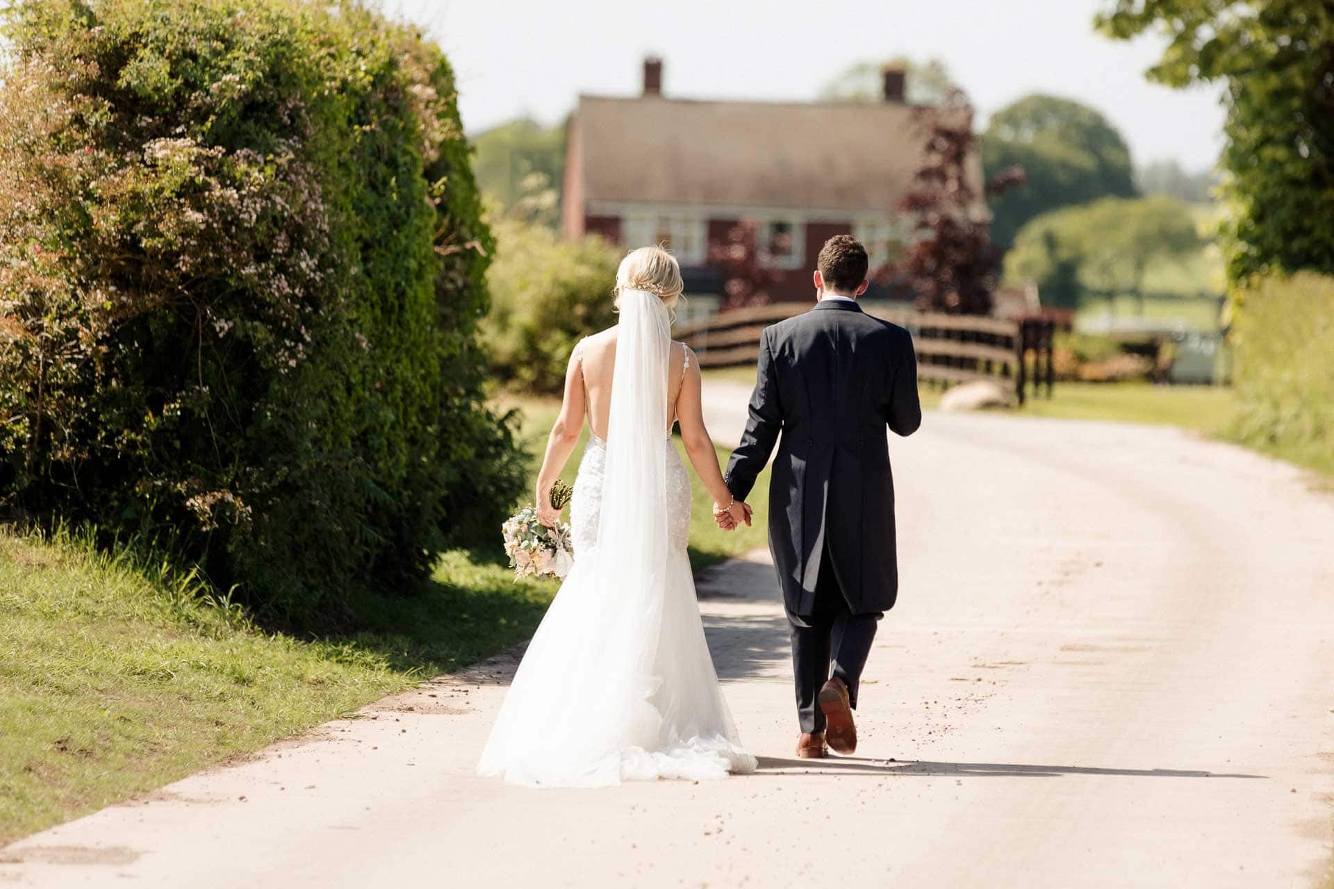 Farm wedding photography for megan and philip on their family farm in August.
